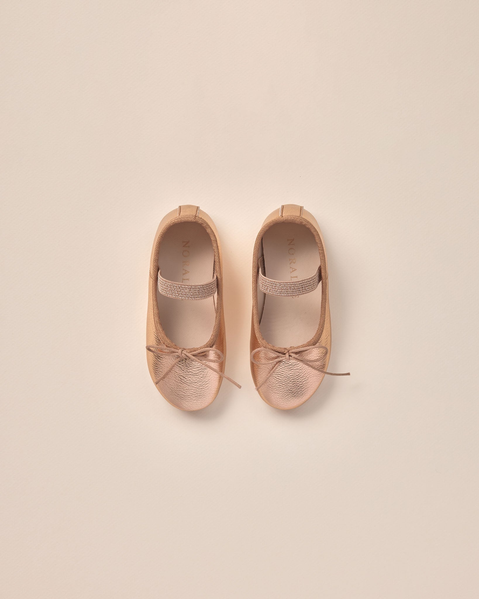 Rose gold metallic flats online