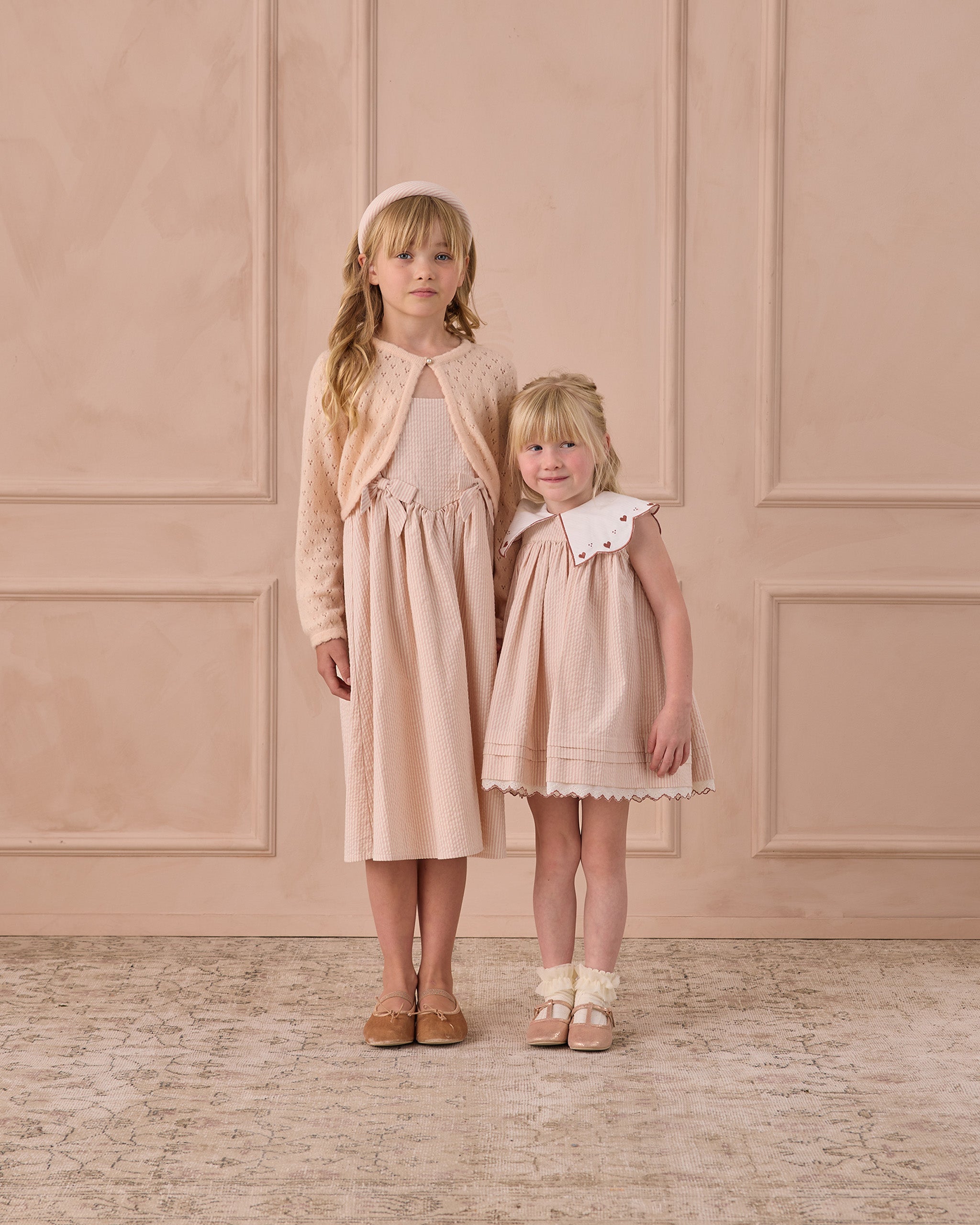 Pull boléro rose poudré