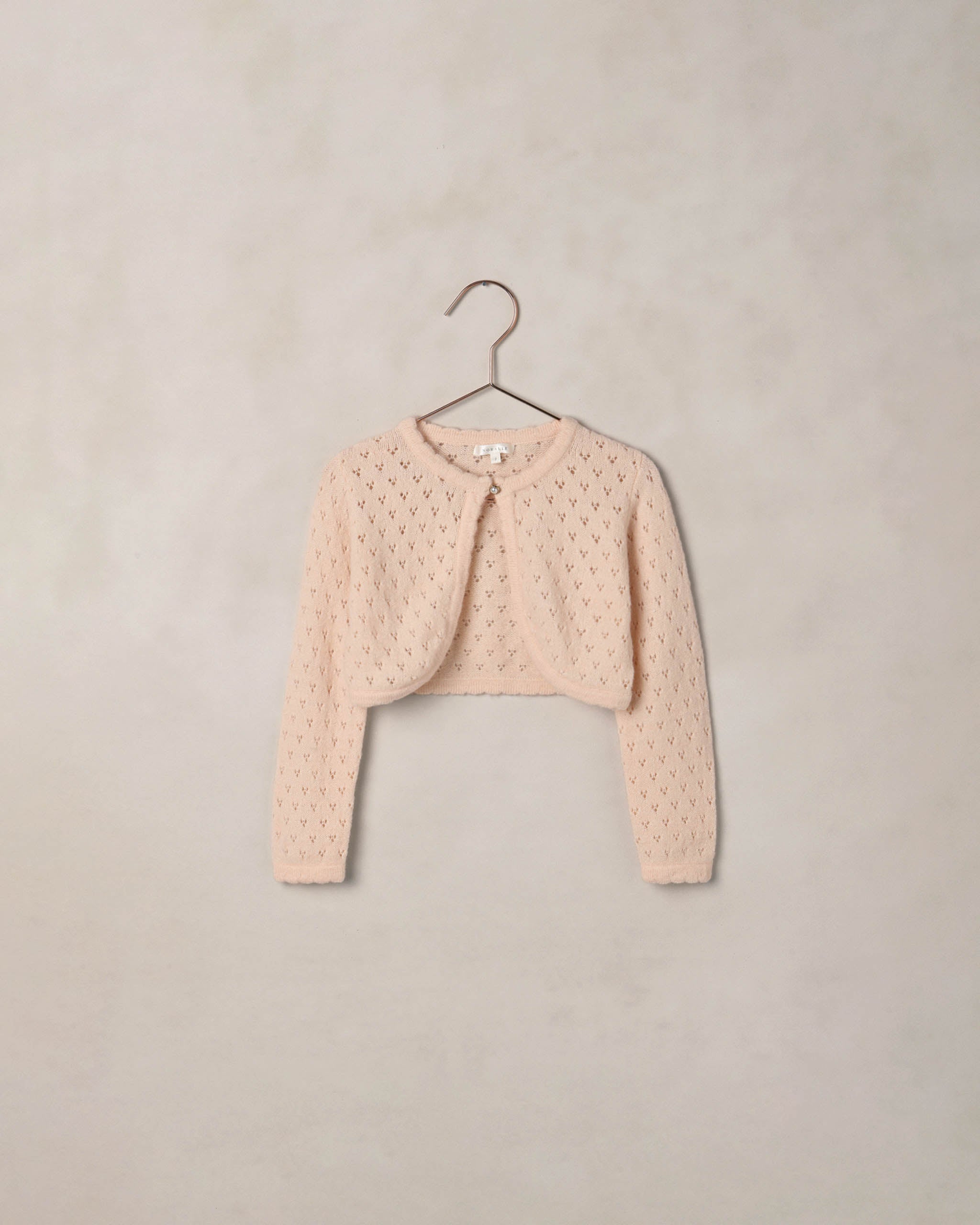 Pull boléro rose poudré