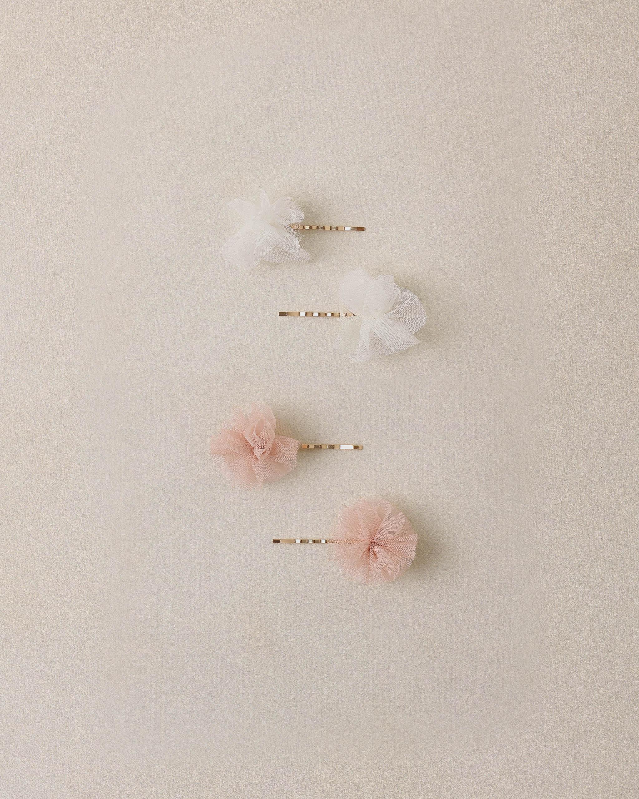 Broches pompon perle rose
