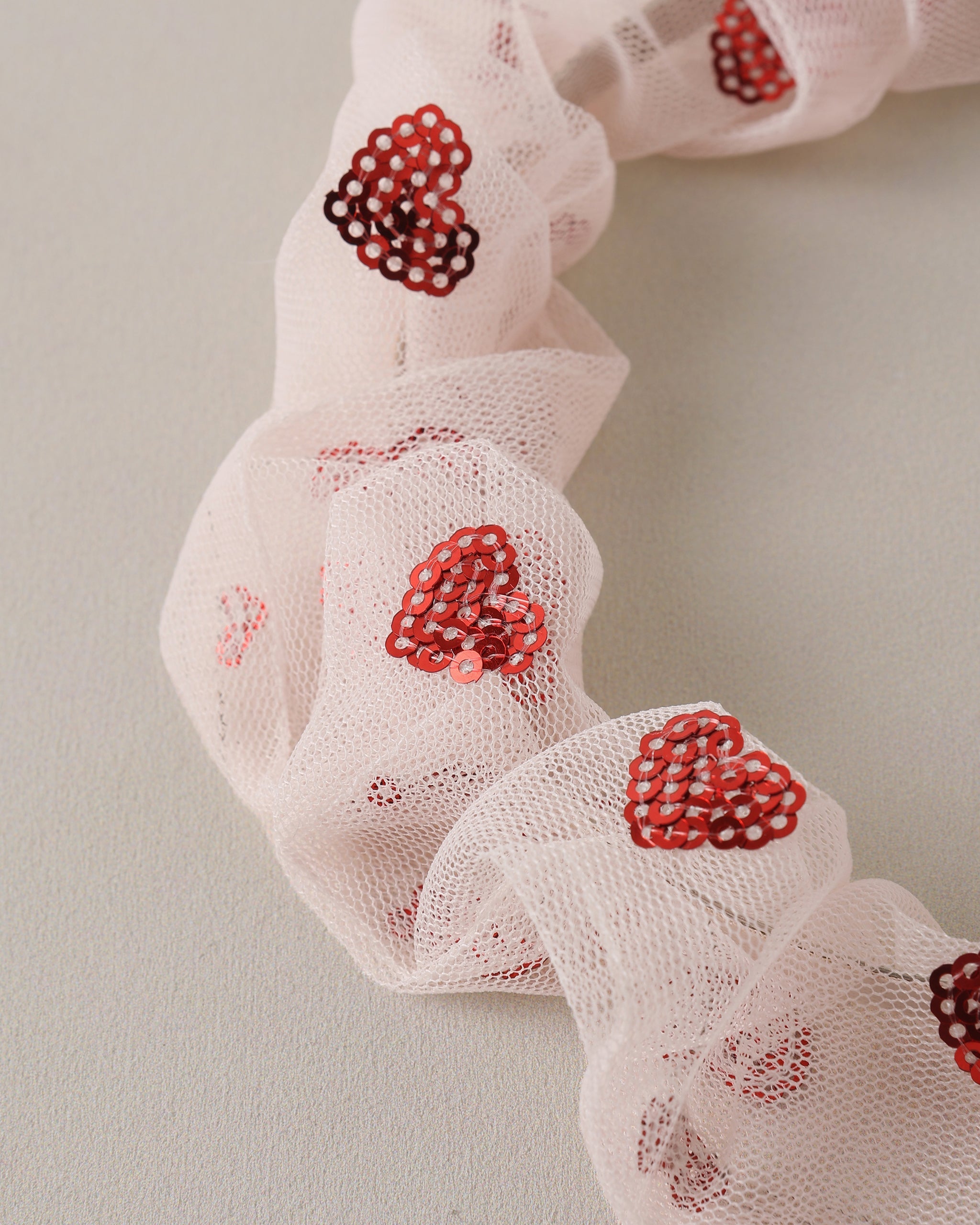 Bandeau à cœurs rouges