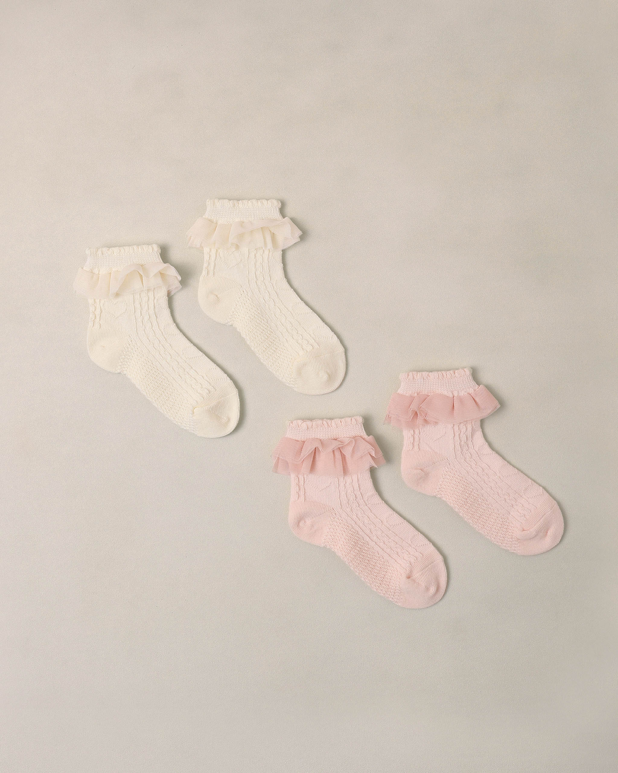 Chaussettes à volants ivoire, rose poudré