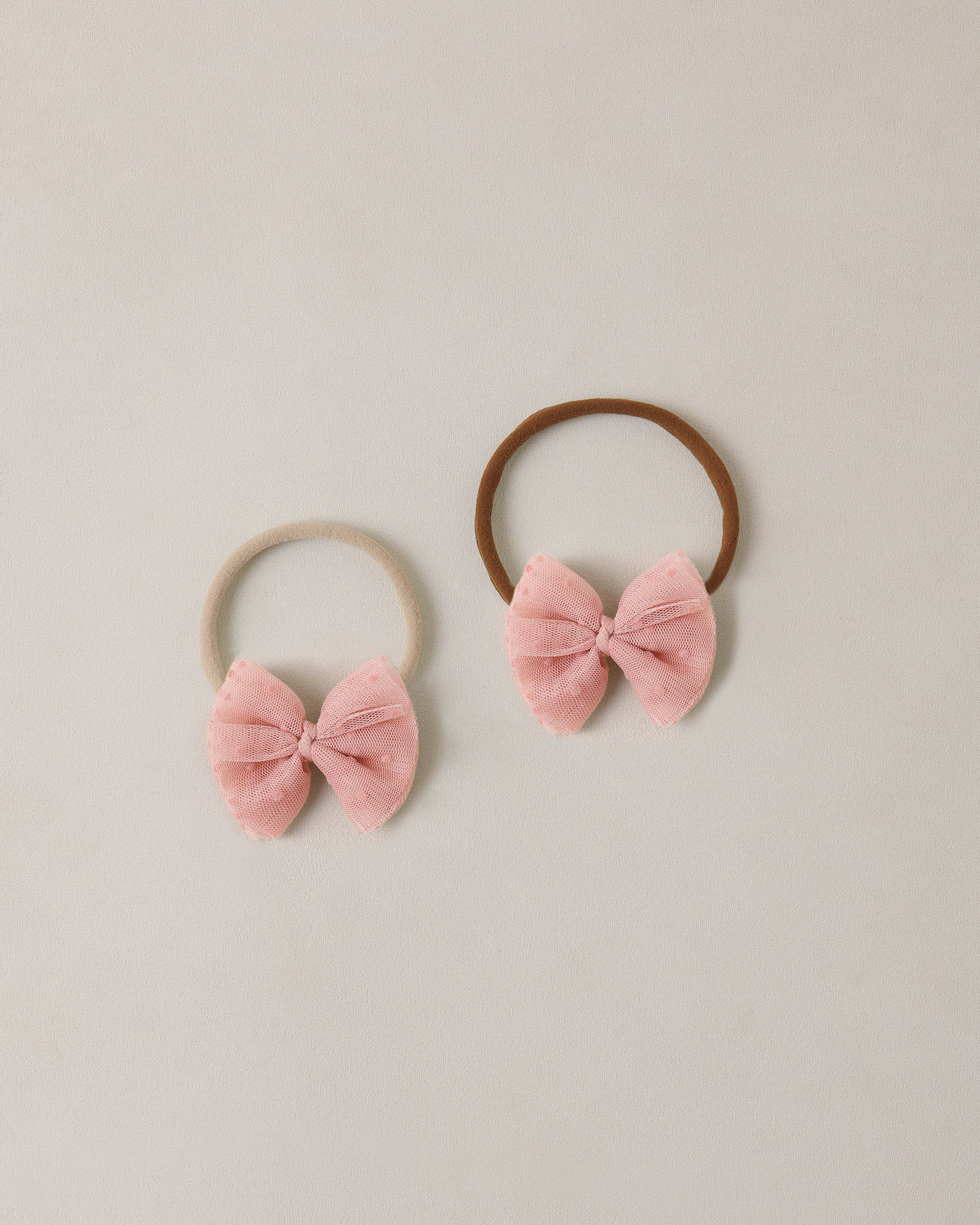 Bandeau en tulle rose à volants