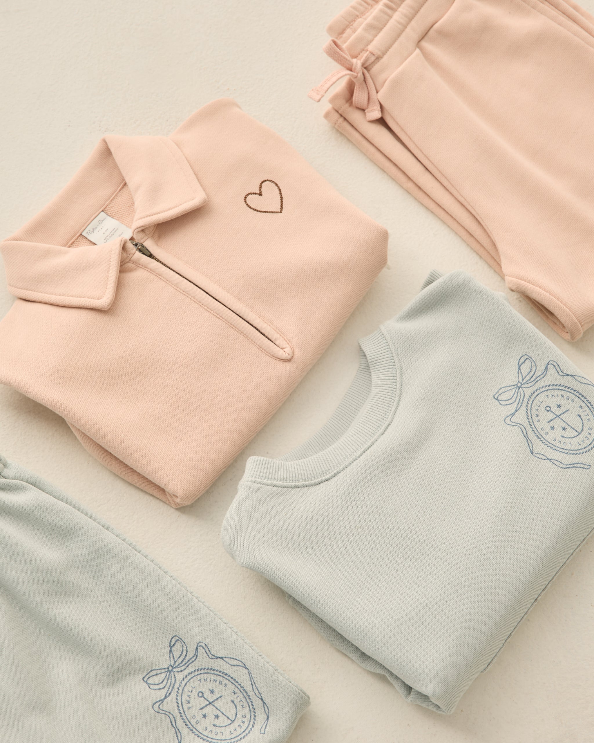 Sweat-shirt à col zippé rose poudré