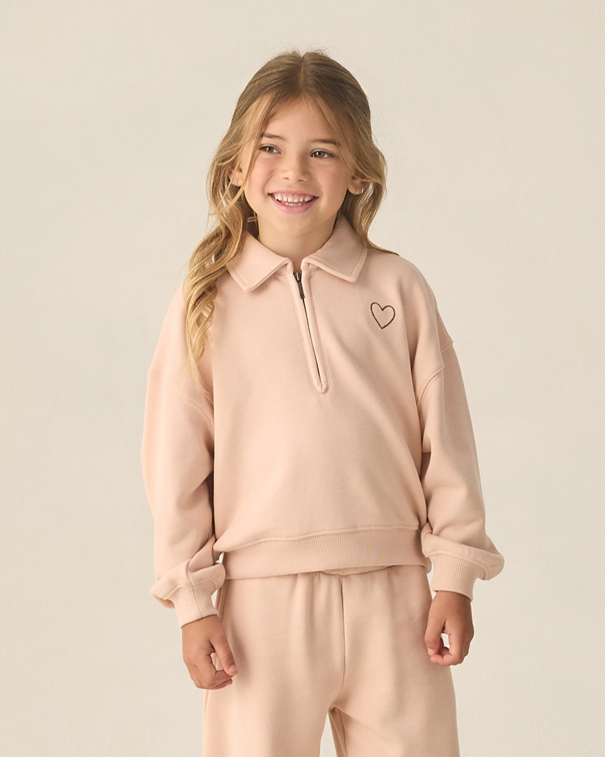 Sweat-shirt à col zippé rose poudré