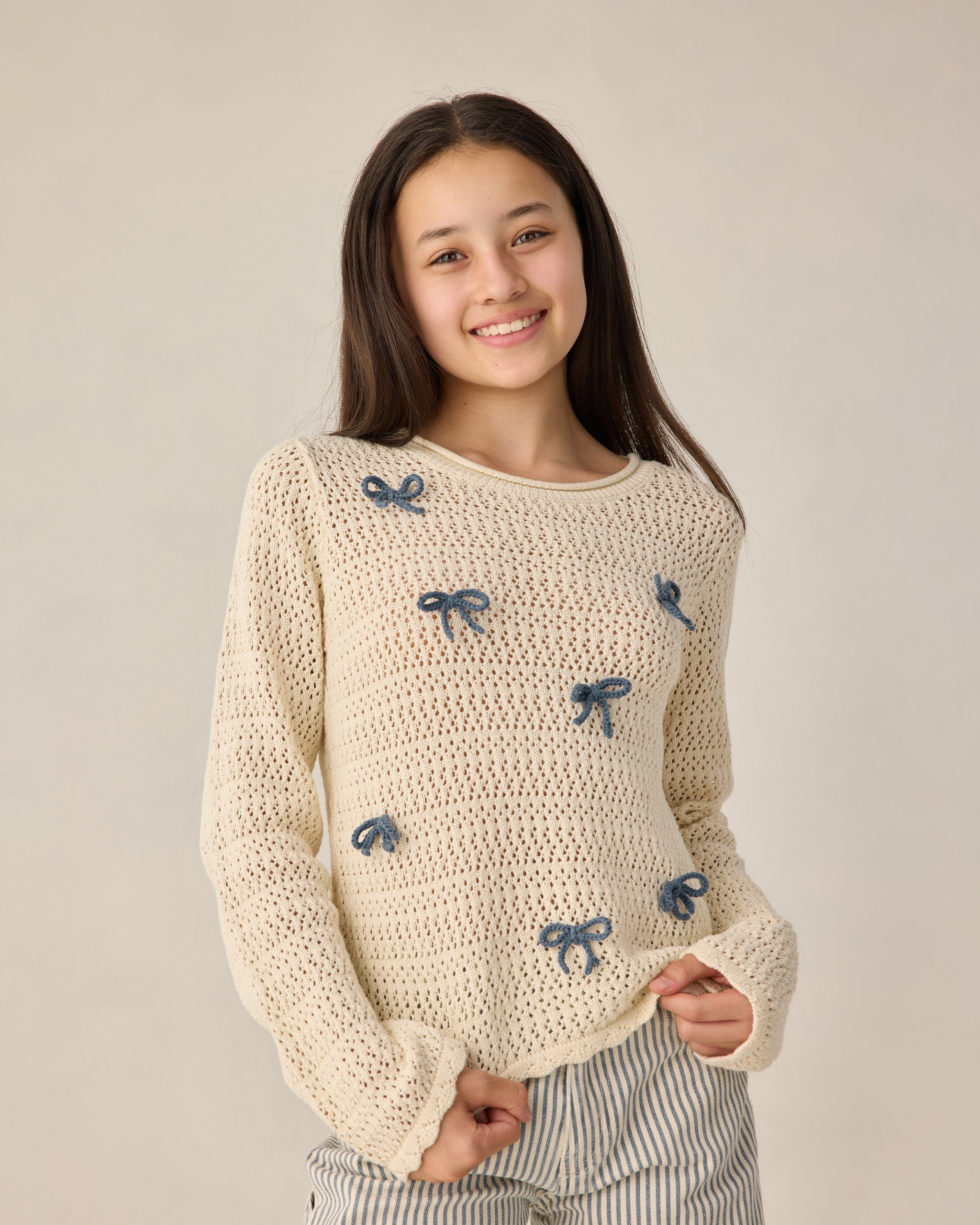 Pulls à nœuds tricotés au crochet pour adolescentes
