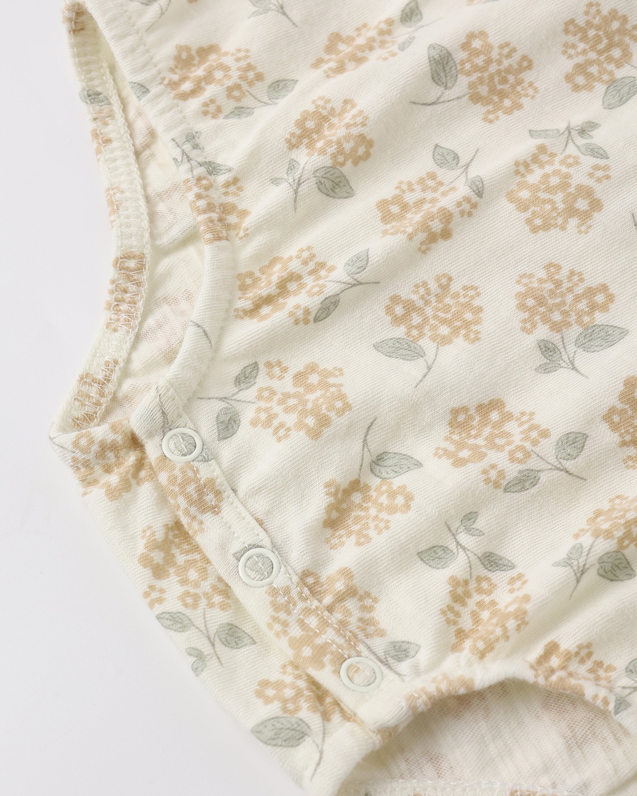 Grenouillère à bulles jaune à petits motifs