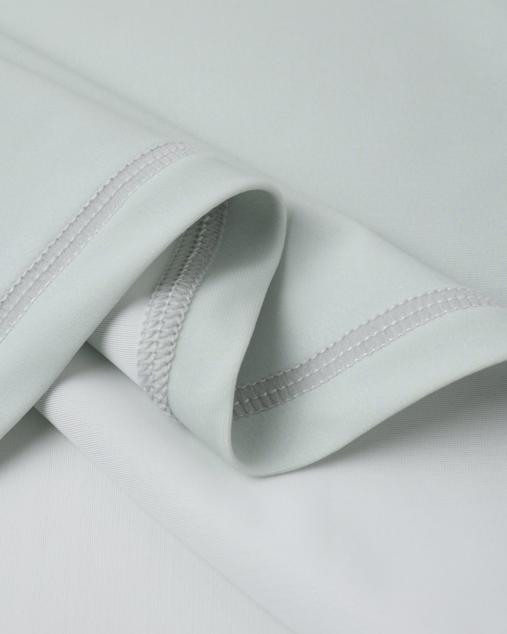 Rashguard manches courtes couleur vert d'eau