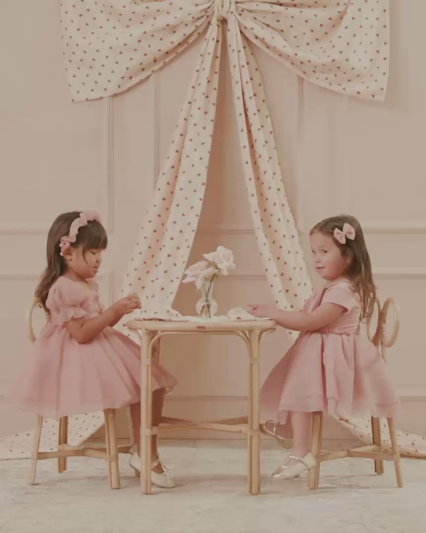 Robe rose pour la Saint-Valentin